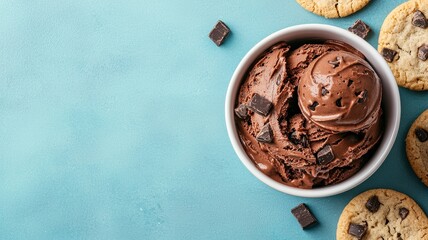 National ice cream day with chocolate sweet idea. Delicious chocolate ice cream with cookies on a teal background.