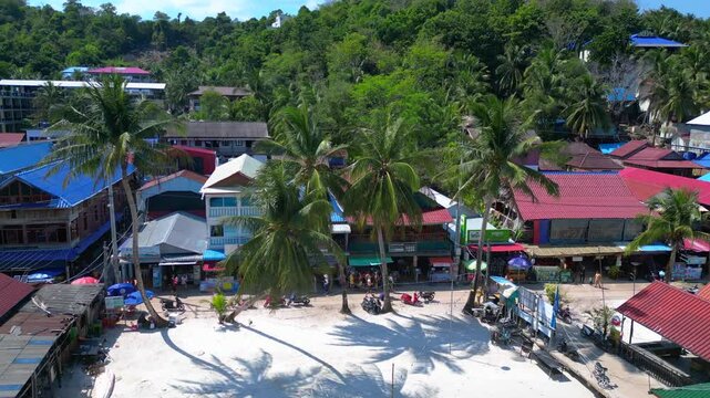 25.2.25 Ko Rong khm, Island Village on Beach. Smooth aerial view flight drone