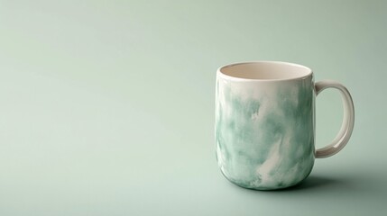 Obraz premium Green Textured Ceramic Mug on Pastel Green Background