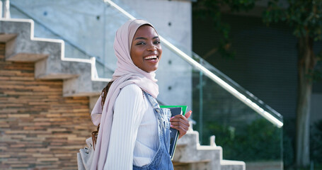 College, campus and portrait of Muslim woman with smile, backpack and study opportunity in education. Culture, equality and happy university student in hijab on morning commute for learning in Rwanda