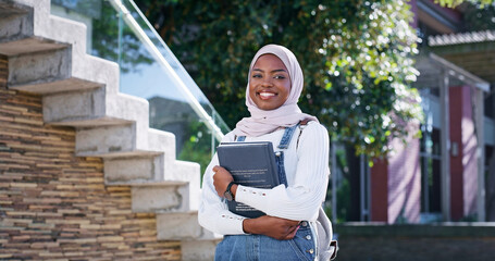Islam, campus and portrait of woman with smile, backpack and study opportunity in education. Muslim culture, equality and happy college student in hijab on morning commute for learning in Rwanda © Dean2000/peopleimages.com