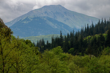 A view of  Pindus  mountains with peak karavoula. Mountain Landscape after rain. Spring time in Greece.