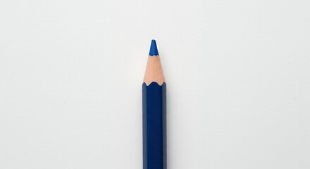 Close-up of a Single Blue Colored Pencil on a White Background