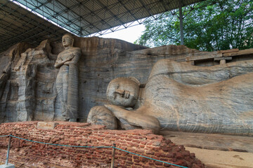Gal Vihara, four magnificent Buddha statues carved from a single granite slab in ancient Polonnaruwa, Sri Lanka