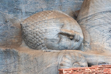 Gal Vihara, four magnificent Buddha statues carved from a single granite slab in ancient Polonnaruwa, Sri Lanka
