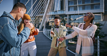 Happy, friends and students dancing outdoor for university break, laughing and comic discussion of reunion. Smile, people and college for movement, bonding together and diversity of social learning
