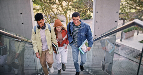College, conversation and walking with friends on stairs at school or university campus for learning. Development, growth or study with man and woman students outdoor together for scholarship