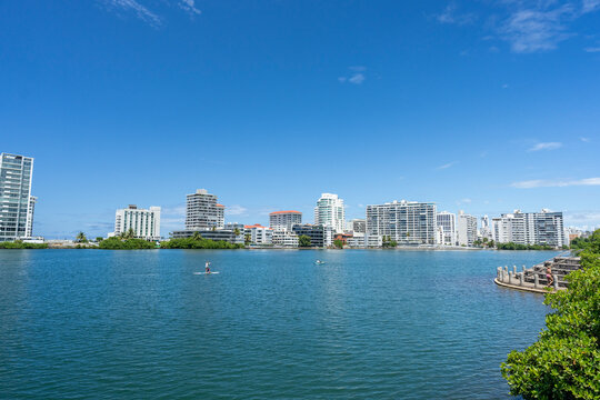 Paddle boarders in the Condado Lagoon in San Juan Puerto Rico 