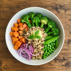 Bowl saludable: quinoa, brócoli, boniato, guisantes y cebolla morada