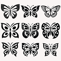 Set of butterfly silhouette vector illustrations on a white background.