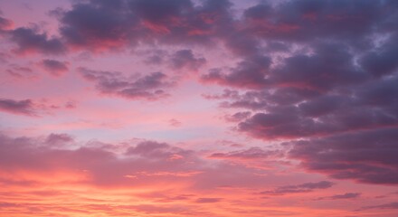 Naklejka premium visually striking pink colored sky filled dramatic accumulated clouds forming non representational artistic pink cloud texture beautiful celestial event end day non representational end of day