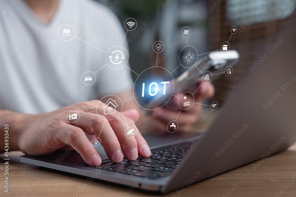 Fototapete man using laptop and smartphone with virtual iot network icons, smart home technology, internet of t