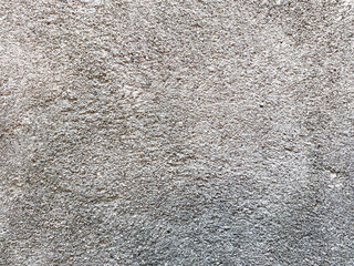 Old grey concrete wall background texture close up
