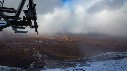 Obraz premium Ski Lift Ride Over Glencoe’s 