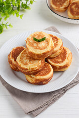 Kue Kamir. Kamir cake. served on a white plate. with copy space. originated from Pemalang, Middle Java, Indonesia.