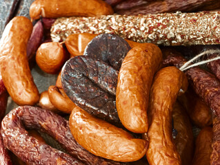 Savory assortment of artisanal sausages crafted with traditional methods at a local market