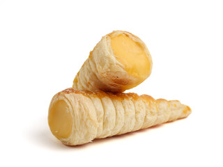 Kue cumcum. Horn pastry or cone pastry with vanilla cream. isolated on white background.