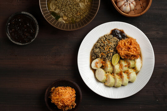 Lontong kupang, or rice cake with small white clams. traditional food of east java, indonesia.
