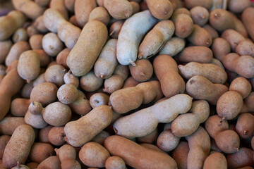 Pile of tamarind on the shop floor for the background