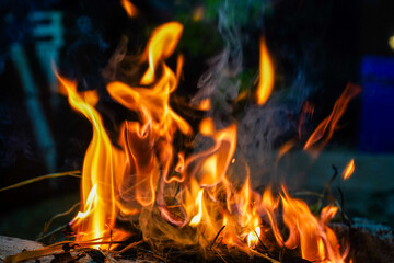 Bonfire makes fire, black background
