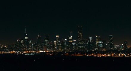 Fototapeta premium City skyline at night, blurred view