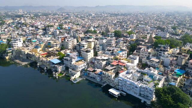 Aerial view of Udaipur city, known for its beautiful lakes, palaces, and historical significance. The city was founded in 1559