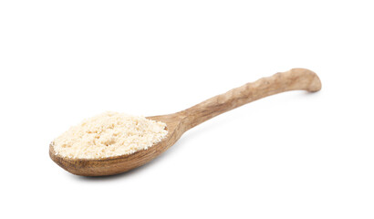 Superfood product. Sesame seeds powder in spoon isolated on white