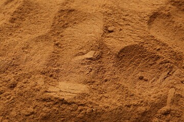 Superfood. Cinnamon powder as background, closeup view