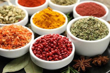 Many different aromatic spices on table, closeup