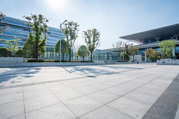 modern business office buildings with empty road,empty concrete square floor	
