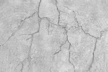 gray ground or white land crack and soil drought with arid on area lacks water and top view for cracked dry concrete floor to agriculture background or retro vintage cement wall and pattern texture