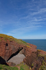The small Shingle Beach at the Mermaids Kirk on the Arbroath Coastal Walk, the remnants of a large...
