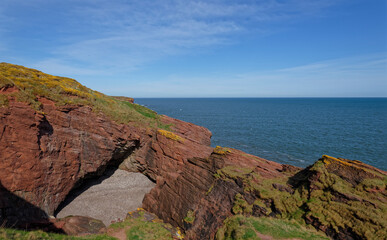 The small Shingle Beach at the Mermaids Kirk on the Arbroath Coastal Walk, the remnants of a large...