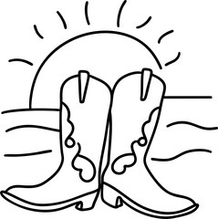 Stylish cowboy boots stand proudly against sunset backdrop, evoking sense of adventure and freedom