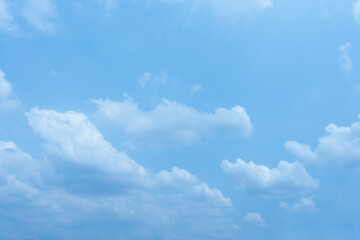 Serene Blue Sky with Scattered Cumulus Clouds Peaceful Nature Background