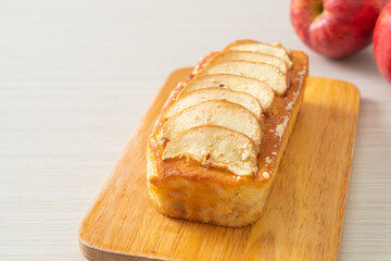apple loaf crumbled on wood board