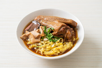 egg noodles with stewed and braised duck in brown soup