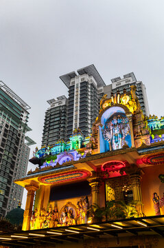 Hindu temple facade with city background in Kuala Lumpur