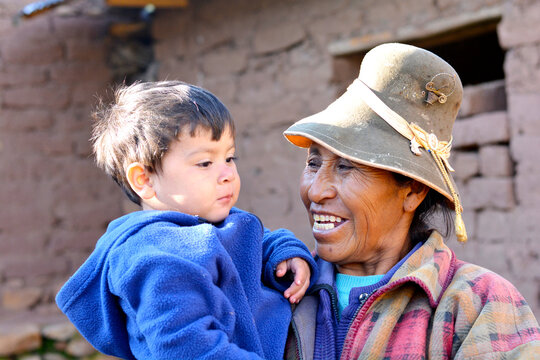 Happy multiracial family - toddler with his grandmother.