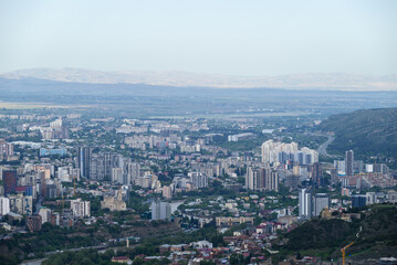 Cityscape of Tbilisi, the capital of Georgia, aerial panoramic view from Mtatsminda Park
