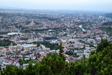 Cityscape of Tbilisi, the capital of Georgia, aerial panoramic view from Mtatsminda Park