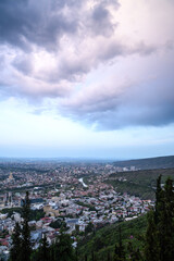 Cityscape of Tbilisi, the capital of Georgia, aerial panoramic view from Mtatsminda Park