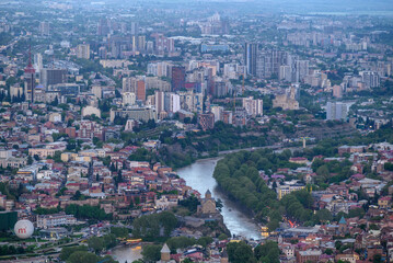 Cityscape of Tbilisi, the capital of Georgia, aerial panoramic view from Mtatsminda Park