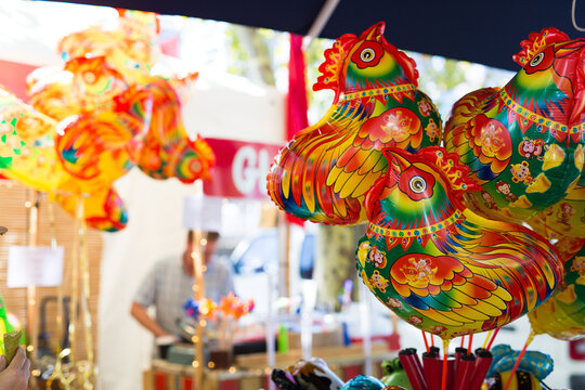 rooster balloons at a chinese new year celebration