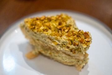 Pistachio Tiramisu served on plate in the restaurant