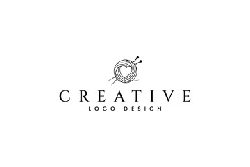 Vector logo on which an abstract image of a love heart ball of wool with knitting needles