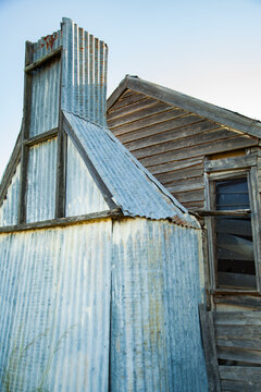 Old tin chimney on a farm outbuilding