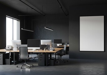 Modern office space with desks computers and a blank poster on the wall in a dark color scheme