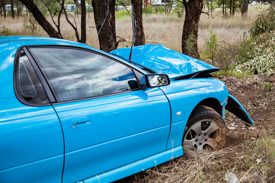 Car smashed up after running off the road and hitting a tree