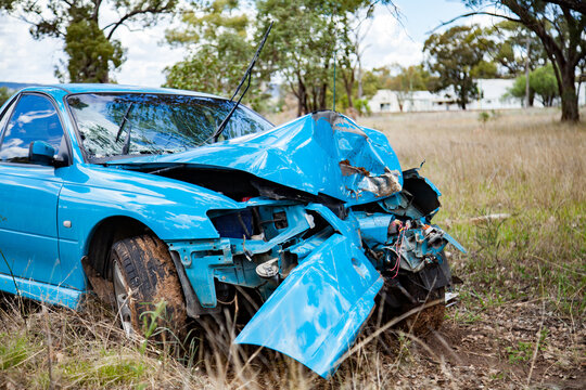 Car smashed up after running off the road and hitting a tree